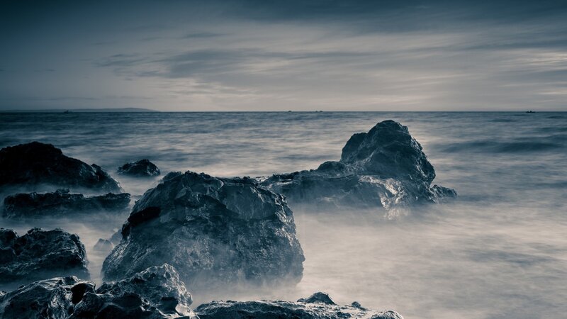 Rocks in Ocean Water — Blue, Calm