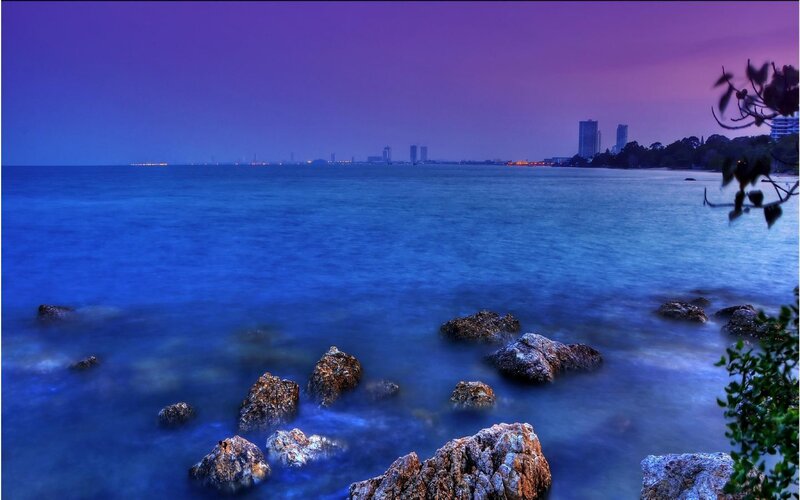 Rocks in Ocean Water — Blue, Serene, Sunset, Photograph