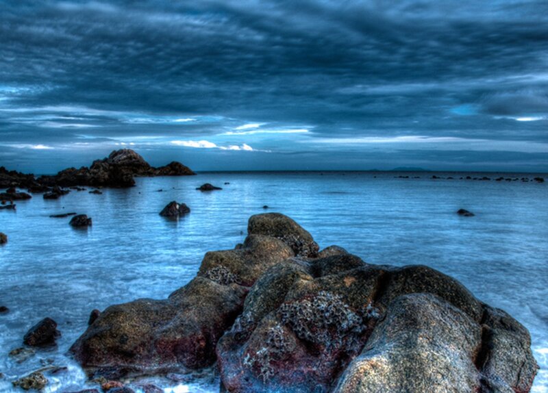 Rocks in Ocean Water — Blue