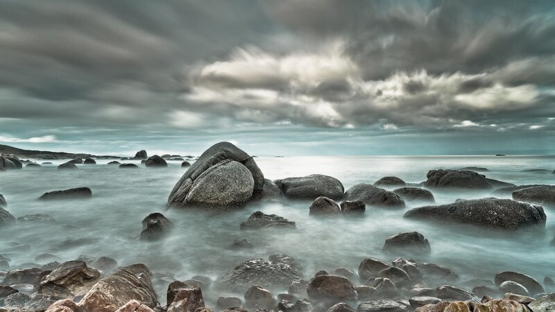 Rocks in Ocean Water — Gray, Dramatic, Photograph