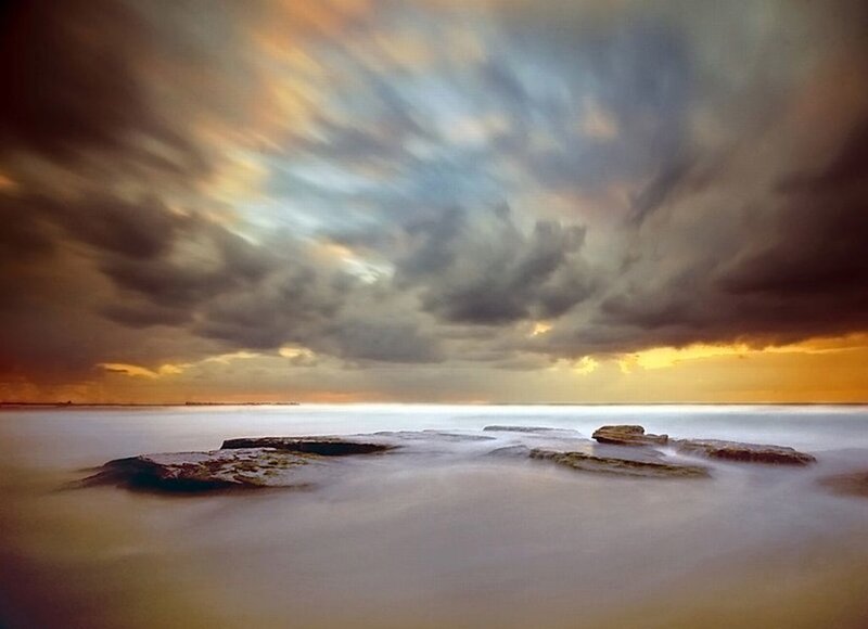 Rocks in Ocean Water — Gray