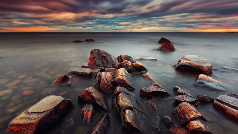 Rocks in Ocean Water — Orange