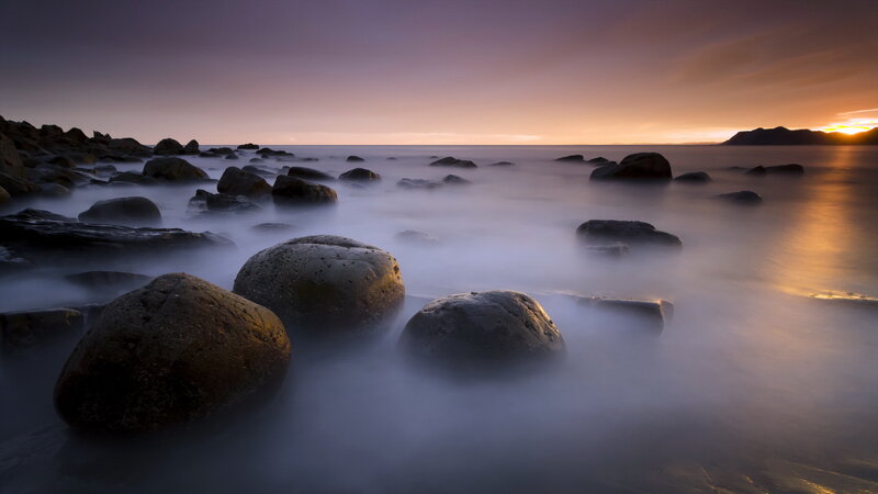 Rocks in Ocean Water — Purple, Serene, Sunset