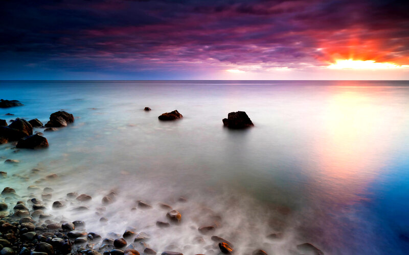 Rocks in Ocean Water — Purple