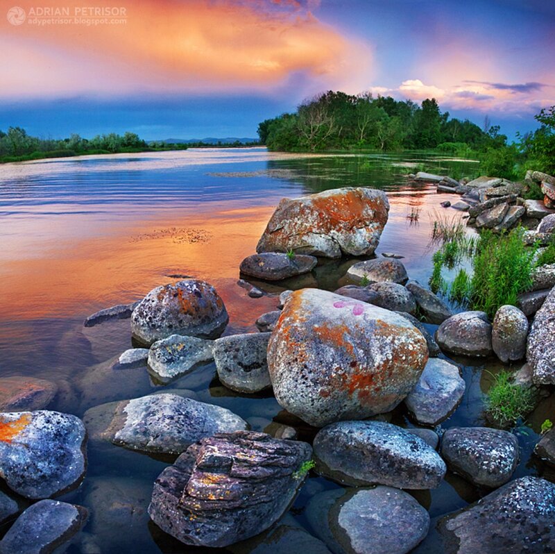 Rocks in River at Sunset