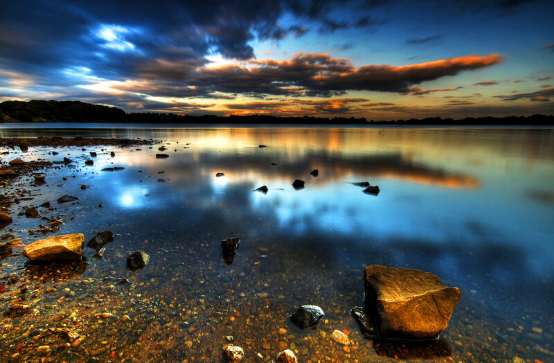 Rocks in Shallow Water — Blue, Dramatic, Sunset, Photograph, Sky