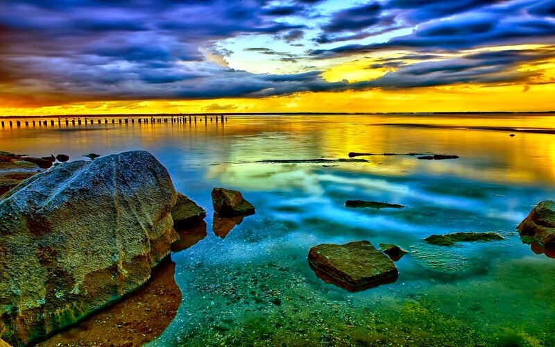 Rocks in Shallow Water — Blue, Dramatic, Sunset, Photograph
