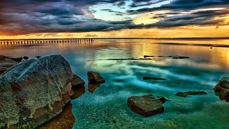 Rocks in Shallow Water — Blue, Dramatic, Sunset