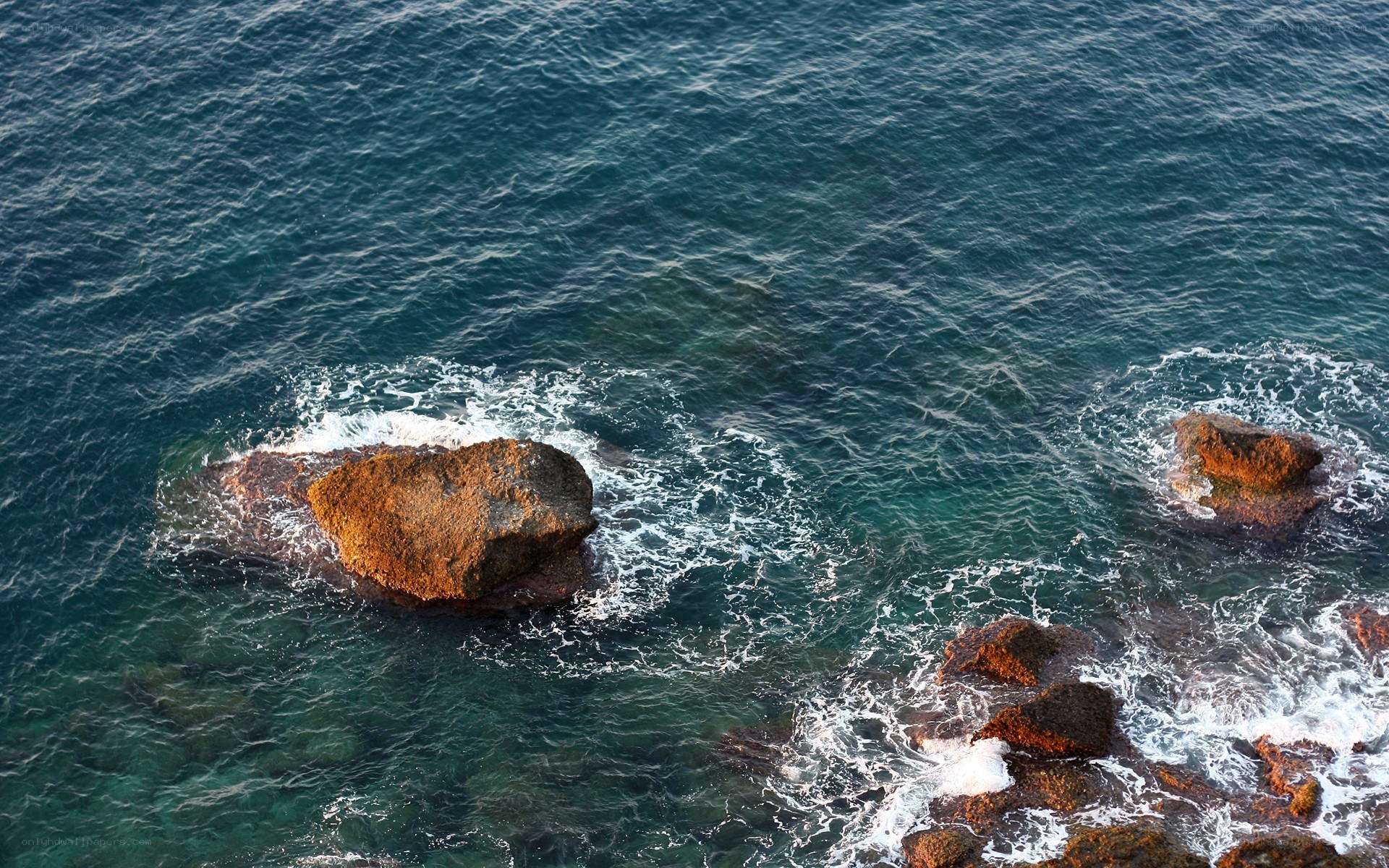 Rocks in the ocean waves