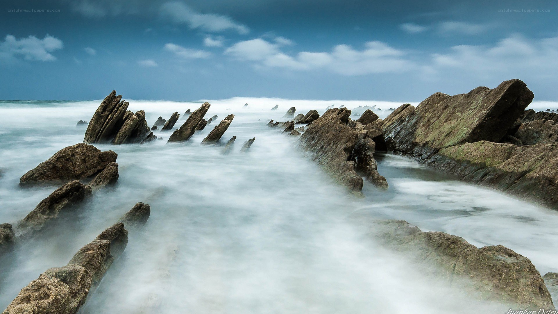 Rocks in the ocean waves