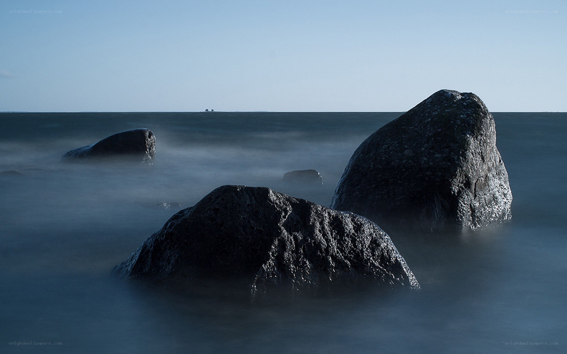 Rocks in the sea at dawn