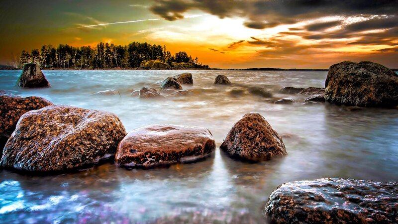 Rocks in Water at Sunset — Orange, Dramatic, Photograph