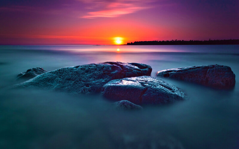 Rocks in Water at Sunset