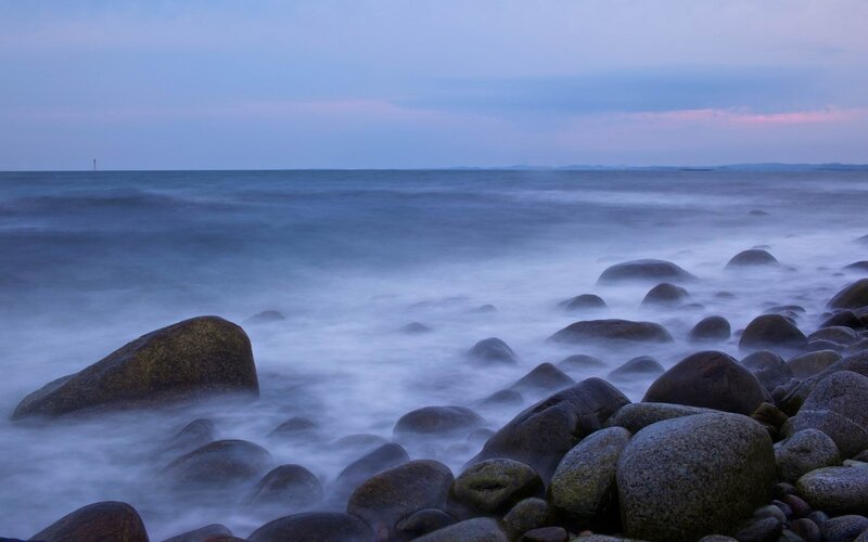 Rocks on a Beach — Blue, Calm, Sunset
