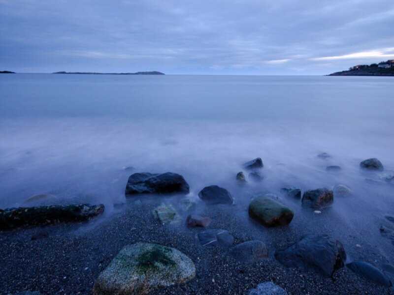 Rocks on a Beach — Blue, Serene, Sunset, Photograph, Ocean