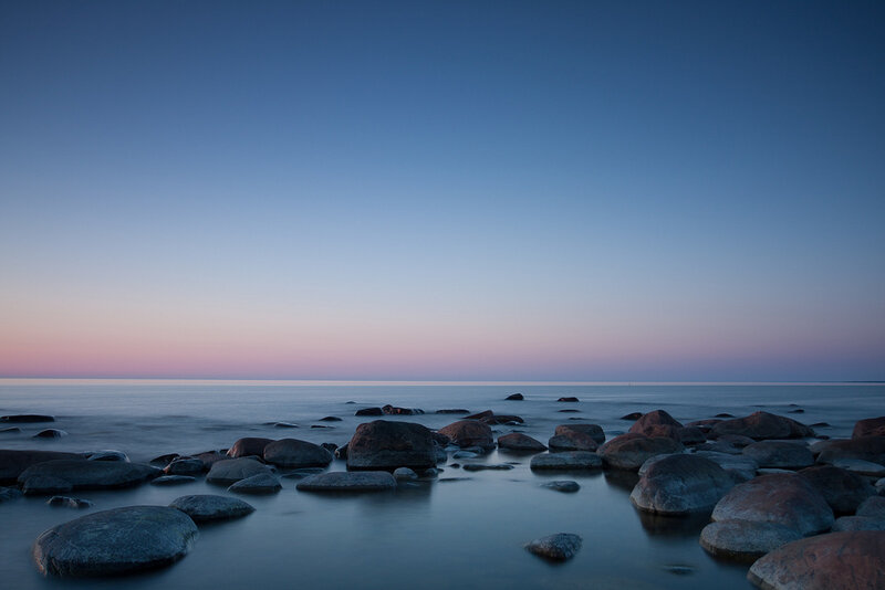 Rocks on a Beach — Blue, Serene, Sunset, Photograph