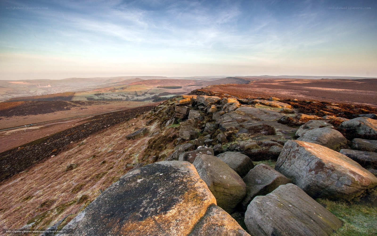 Rocks on a hilltop at sunrise