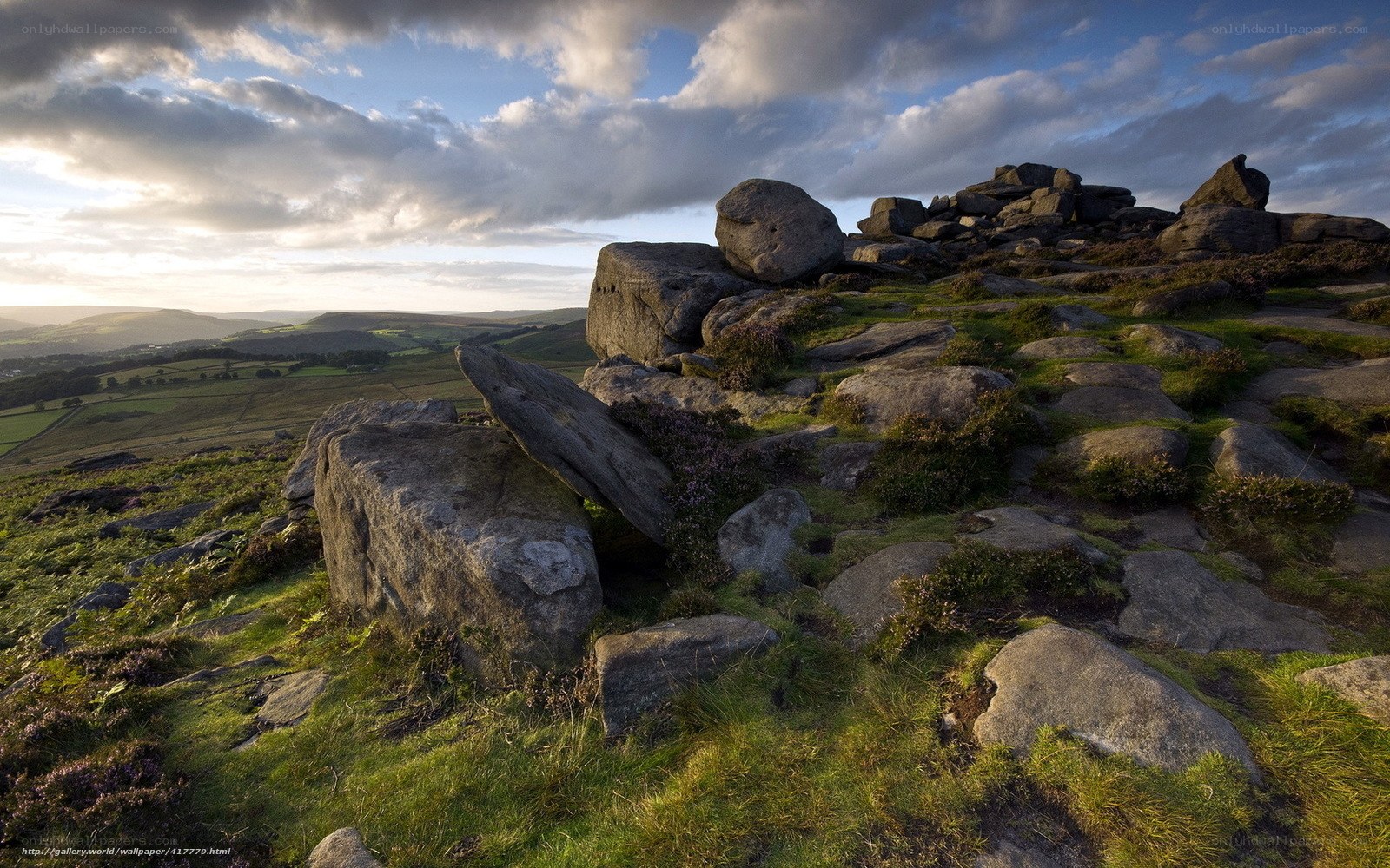 Rocks on a hilltop at sunset