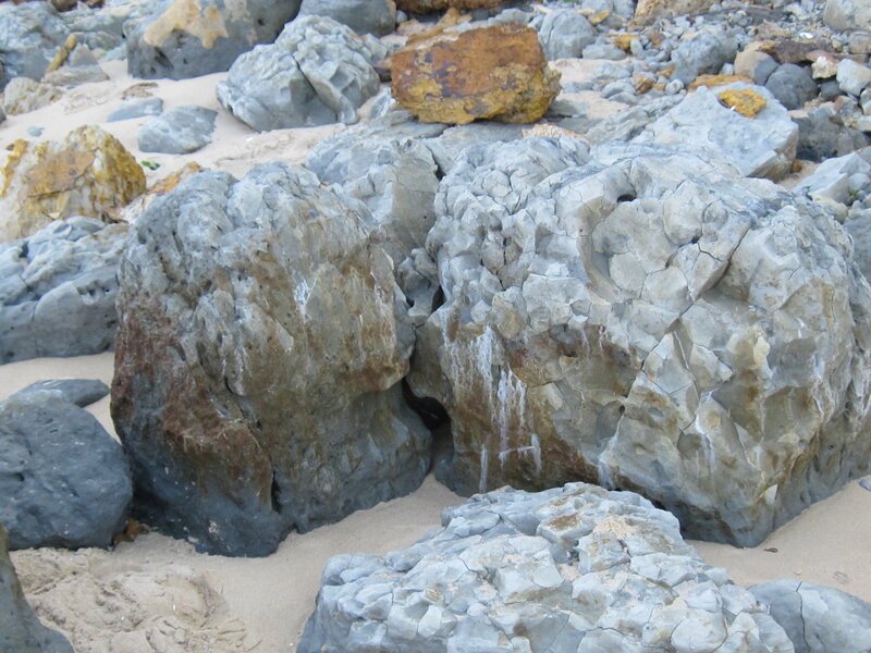 rocks on a sandy beach
