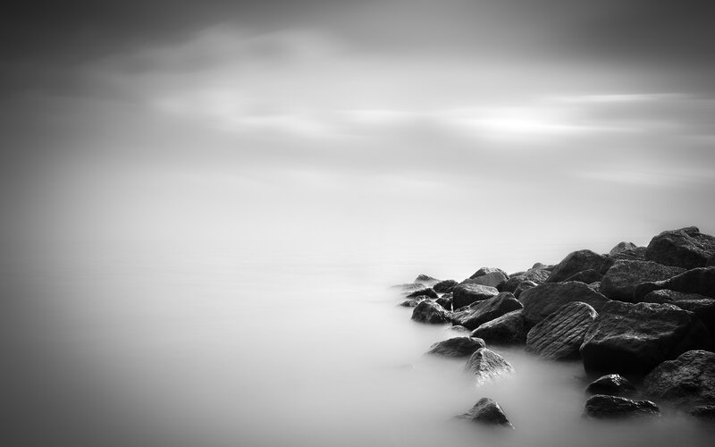 Rocks on a Shoreline — Black, Serene