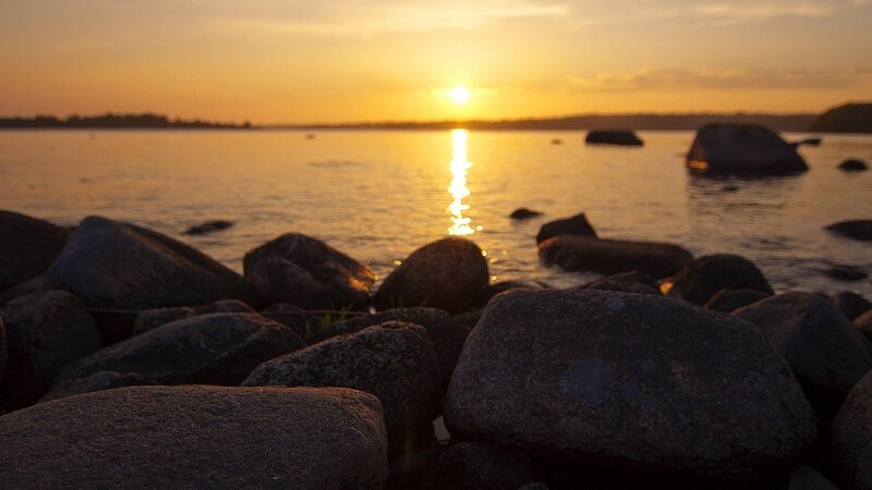 Rocks on a Shoreline — Orange, Serene, Sunset