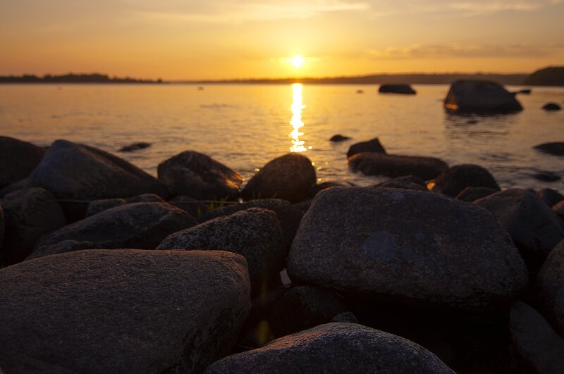 Rocks on a Shoreline — Orange, Serene