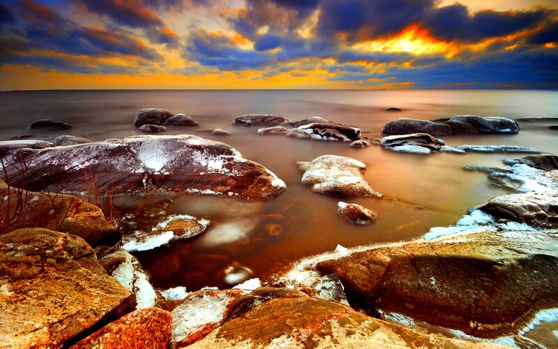 Rocks on a Shoreline — Orange