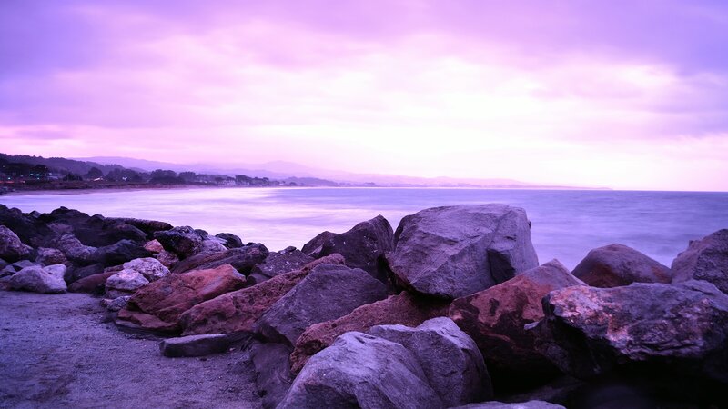 Rocks on Beach at Dusk — Purple, Serene, Sunset