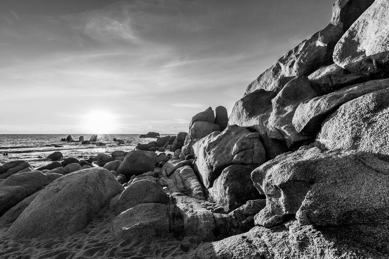 Rocks on Beach at Sunset — Black