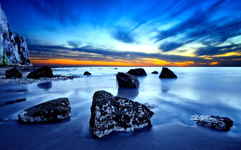 Rocks on Beach at Sunset — Blue, Dramatic, Photograph, Cliffs