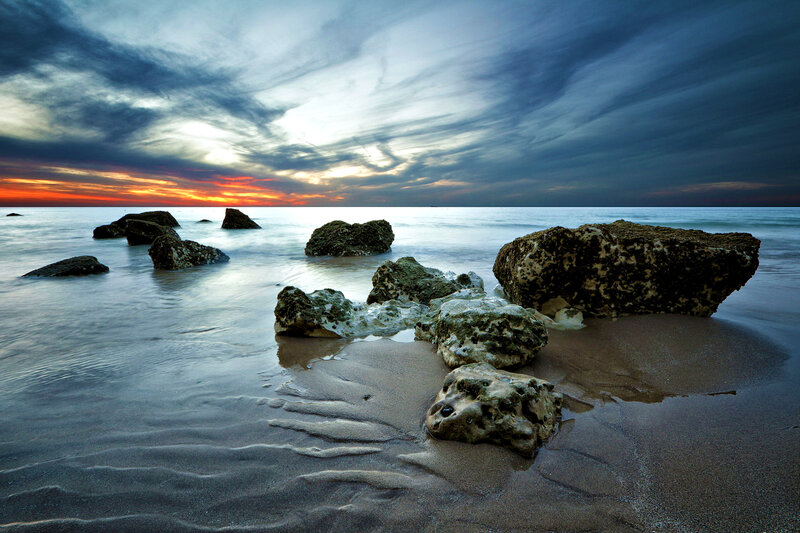 Rocks on Beach at Sunset — Blue, Dramatic, Photograph, Ocean, Sky, Sand