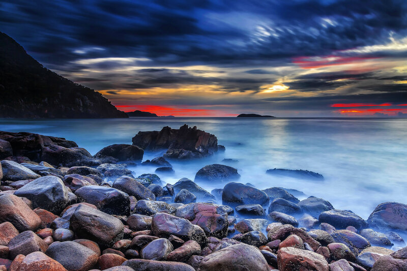 Rocks on Beach at Sunset — Blue, Dramatic, Photograph, Sea