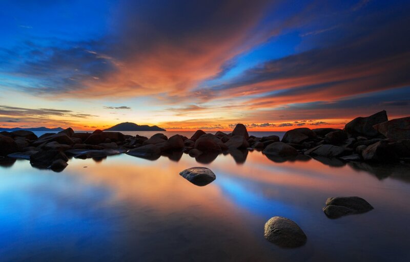 Rocks on Beach at Sunset — Blue, Dramatic, Photograph, Sky, Clouds
