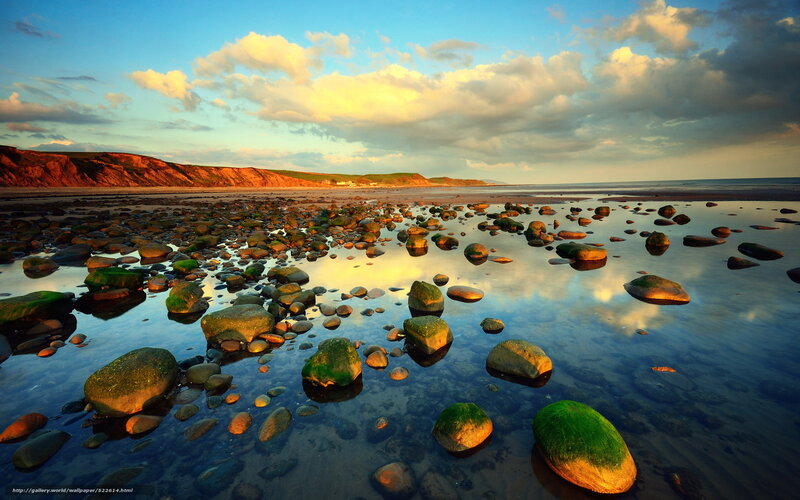 Rocks on Beach at Sunset — Blue, Serene, Photograph, Cliffs, Clouds