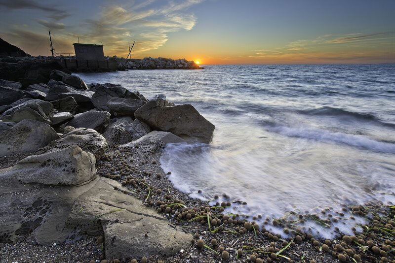 Rocks on Beach at Sunset — Blue, Serene, Photograph, Ocean, Rock Wall