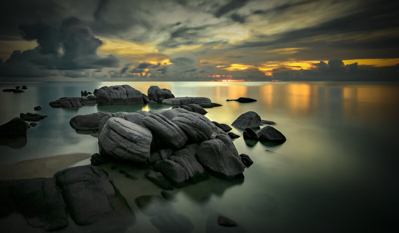 Rocks on Beach at Sunset — Gray, Dramatic, Photograph, Sea