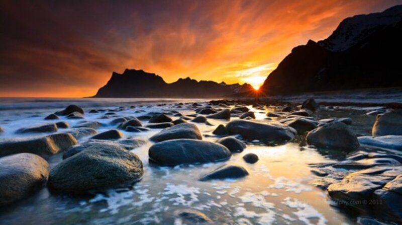 Rocks on Beach at Sunset — Orange, Dramatic, Photograph, Mountains