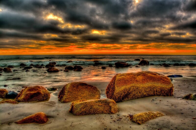 Rocks on Beach at Sunset — Orange, Dramatic, Photograph, Ocean, Sky, Clouds, Gray, Brown