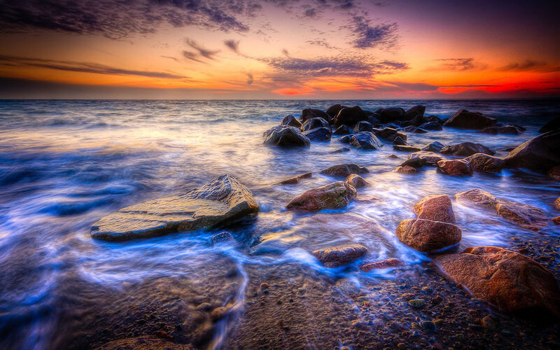 Rocks on Beach at Sunset — Orange, Dramatic, Photograph