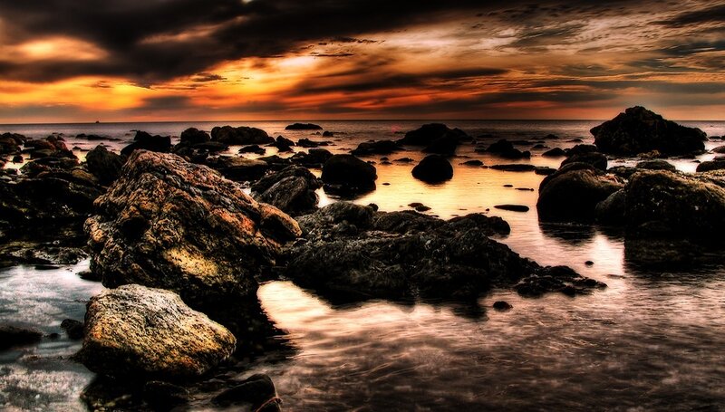 Rocks on Beach at Sunset — Orange, Dramatic