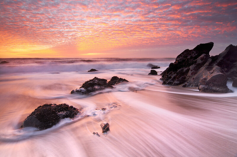 Rocks on Beach at Sunset — Orange, Serene, Photograph, Ocean, Sky, Sand