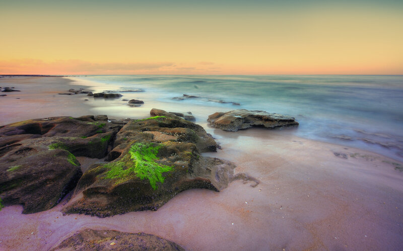 Rocks on Beach at Sunset — Orange, Serene, Photograph, Sand