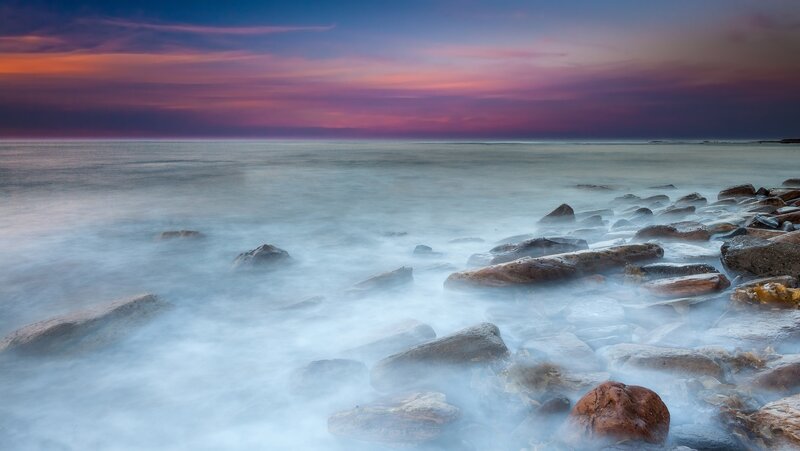 Rocks on Beach at Sunset — Purple, Serene, Photograph, Ocean, Sky, Pink, Blue