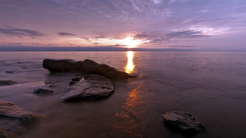 Rocks on Beach at Sunset — Purple, Serene, Photograph, Sun, Sky