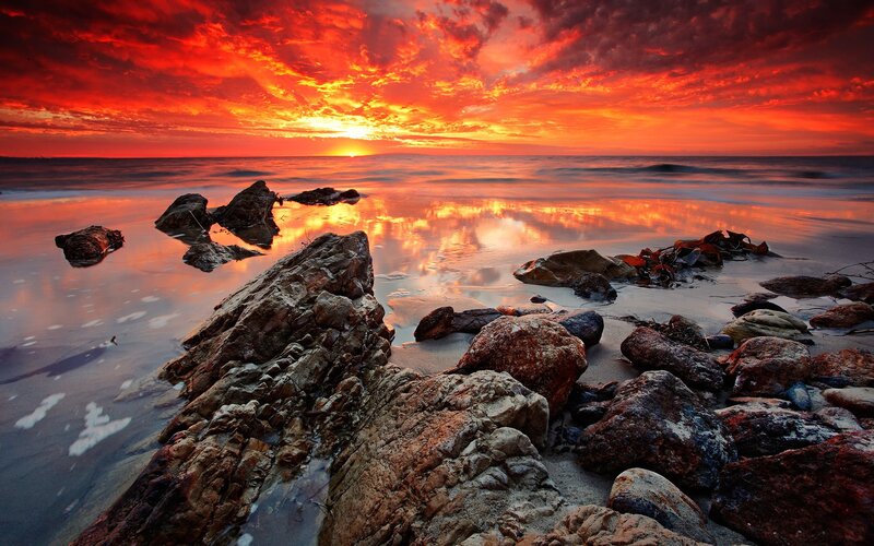 Rocks on Beach at Sunset — Red, Dramatic, Photograph, Ocean, Sky, Clouds, Orange, Black