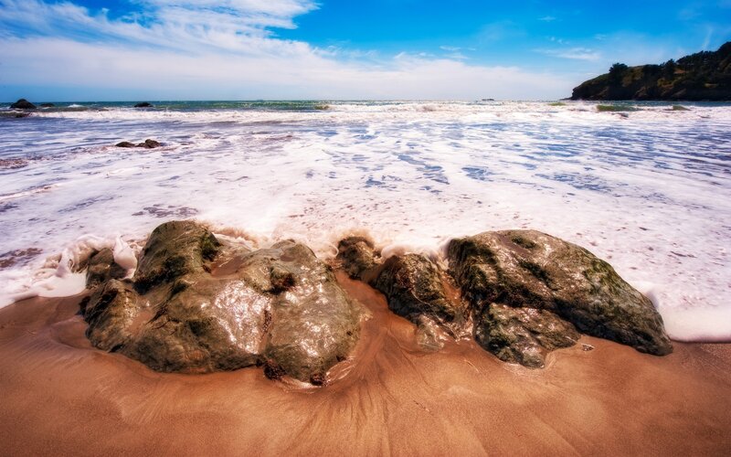 Rocks on Sandy Beach — Blue, Serene, Afternoon