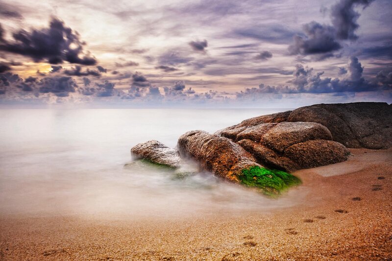 Rocks on Sandy Beach — Brown, Dramatic