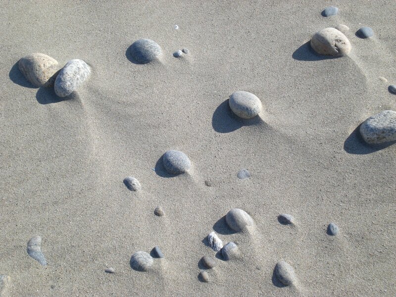 rocks on sandy beach