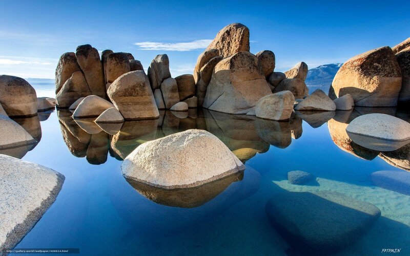 rocks reflected in lake water