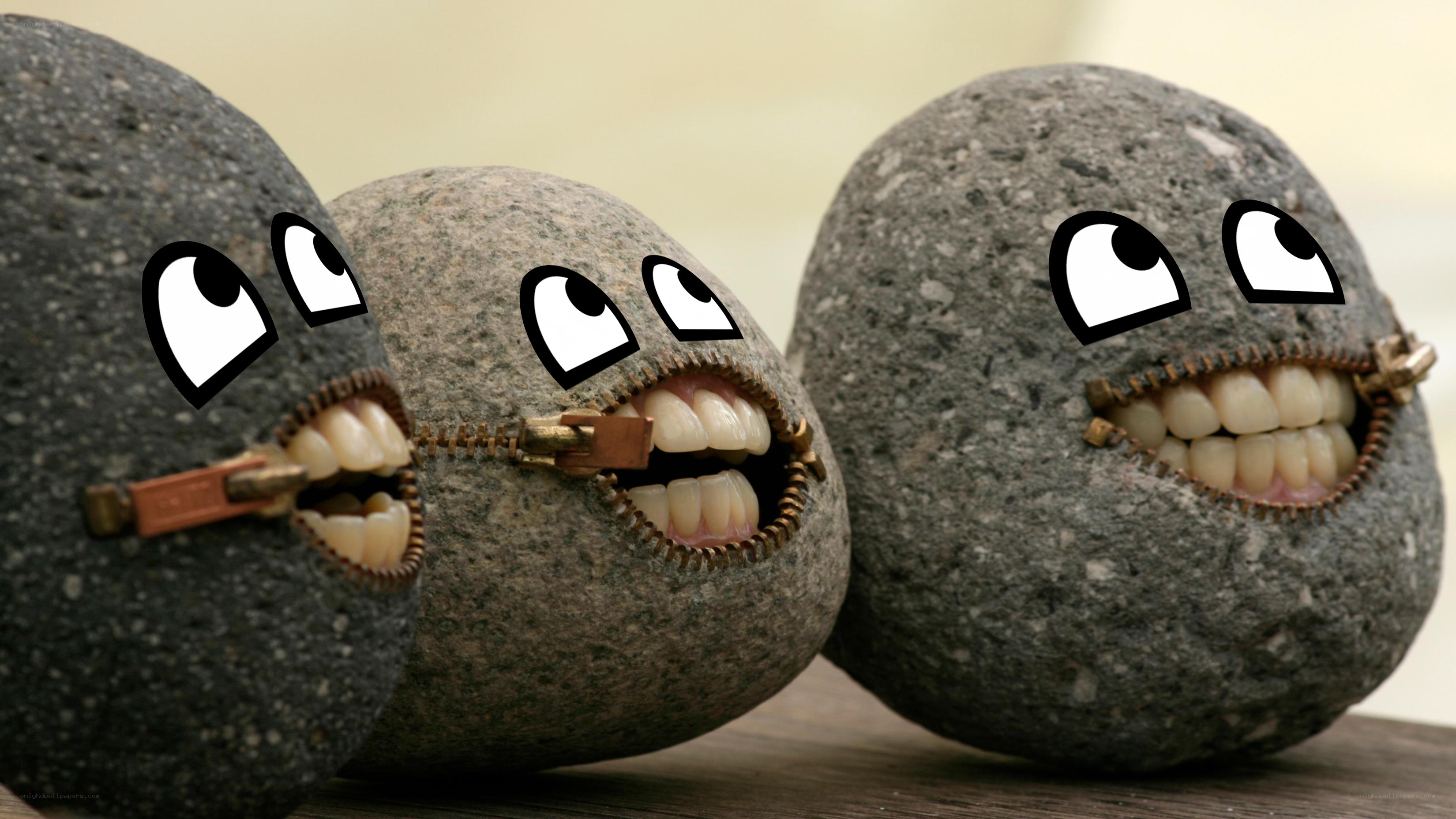 rocks with cartoon faces